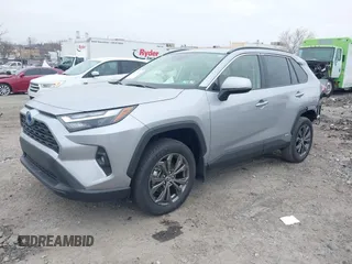 2024 Toyota RAV4 Hybrid XLE Premium with VIN JTMB6RFV0RD140022, listed as a IAAI auction lot 41779613 with 923 mi miles. Bid and sale history available at carsss.com. Image 2.