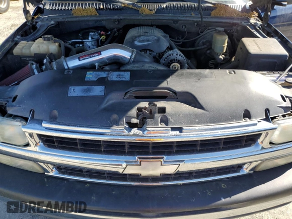 2002 Chevrolet Tahoe LS z VIN 1GNEC13T42R256432, wystawiony jako Copart lot #51706375 z przebiegiem 193 298 mil mil oraz Szkoda całkowita • Salvage title. Historia ofert i sprzedaży dostępna na DreamBid. Obrazek 12.