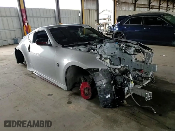 2015 Nissan 370Z Nismo z VIN JN1AZ4EH1FM441060, wystawiony jako Copart lot #53423725 z przebiegiem Nie podano mil oraz Szkoda całkowita • Salvage title. Historia ofert i sprzedaży dostępna na DreamBid. Obrazek 10.