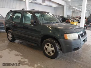 2003 Ford Escape XLS Popular with VIN 1FMYU02143KC35891, listed as a IAAI auction lot 41599760 with 148,381 mi miles. Bid and sale history available at carsss.com. Image 1.