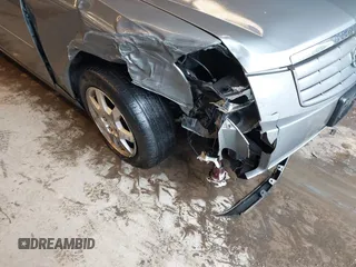 2005 Cadillac CTS z VIN 1G6DP567750131547, wystawiony jako IAAI lot #42525601 z przebiegiem 68 944 mil mil oraz . Historia ofert i sprzedaży dostępna na DreamBid. Obrazek 6.