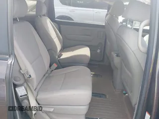 2016 Kia Sedona LX with VIN KNDMB5C11G6158934, listed as a IAAI auction lot 41908323 with 105,888 mi miles and . Bid and sale history available at carsss.com. Image 8.