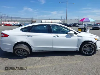 2016 Ford Fusion SE with VIN 3FA6P0H75GR284362, listed as a IAAI auction lot 42067568 with 132,557 mi miles and . Bid and sale history available at DreamBid. Image 6.