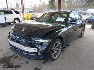 2018 BMW 3 Series 330i xDrive with VIN WBA8D9G56JNU70886, listed as a IAAI auction lot 41752477 with 35,960 mi miles. Bid and sale history available at carsss.com. Image 2.