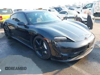 2022 Porsche Taycan z VIN WP0AA2Y10NSA11640, wystawiony jako IAAI lot #41215410 z przebiegiem 25 749 mil mil oraz . Historia ofert i sprzedaży dostępna na DreamBid. Obrazek 1.