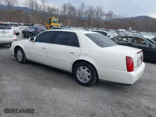 2004 Cadillac DeVille with VIN 1G6KD54YX4U196279, listed as a IAAI auction lot 41640838 with 148,981 mi miles. Bid and sale history available at carsss.com. Image 3.