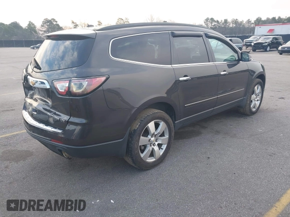 2015 Chevrolet Traverse LTZ with VIN 1GNKVJKDXFJ206159, listed as a IAAI auction lot 41762515 with 143,062 mi miles and . Bid and sale history available at DreamBid. Image 4.