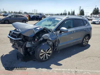2023 Volkswagen Taos SE z VIN 3VVEX7B24PM364147, wystawiony jako Copart lot #52914615 z przebiegiem 15 186 mil mil oraz Szkoda całkowita • Salvage title. Historia ofert i sprzedaży dostępna na DreamBid. Obrazek 1.