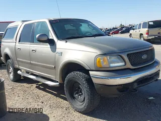 2002 Ford F-150 XLT with VIN 1FTRW08L62KC96671, listed as a IAAI auction lot 41832195 with 355,650 mi miles. Bid and sale history available at carsss.com. Image 1.