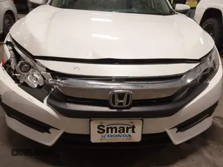 2018 Honda Civic EX with VIN 19XFC2F74JE005647, listed as a IAAI auction lot 41938607 with 90,263 mi miles and . Bid and sale history available at DreamBid. Image 6.