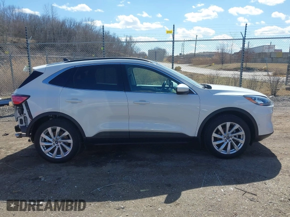 2022 Ford Escape Titanium with VIN 1FMCU9J93NUA99685, listed as a IAAI auction lot 41867437 with 36,987 mi miles and . Bid and sale history available at DreamBid. Image 14.