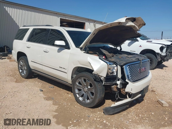 2015 GMC Yukon Denali with VIN 1GKS2CKJ3FR568729, listed as a IAAI auction lot 41741987 with 154,729 mi miles. Bid and sale history available at carsss.com. Image 1.