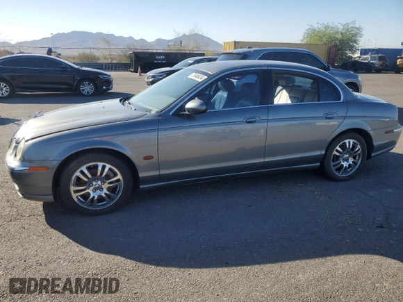 2003 Jaguar S-Type z VIN SAJEA01U03HM57757, wystawiony jako Copart lot #73440434 z przebiegiem 188 389 mil mil oraz Szkoda całkowita • Salvage title. Historia ofert i sprzedaży dostępna na DreamBid. Obrazek 1.