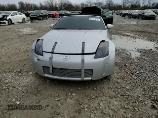 2004 Nissan 350Z Enthusiast z VIN JN1AZ36A74T013105, wystawiony jako Copart lot #82797874 z przebiegiem Nie podano mil oraz Szkoda całkowita • Salvage title. Historia ofert i sprzedaży dostępna na DreamBid. Obrazek 11.