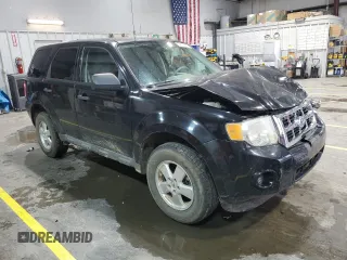 2011 Ford Escape XLS z VIN 1FMCU9C77BKC43662, wystawiony jako Copart lot #51779335 z przebiegiem 104 548 mil mil oraz Szkoda całkowita • Salvage title. Historia ofert i sprzedaży dostępna na DreamBid. Obrazek 4.