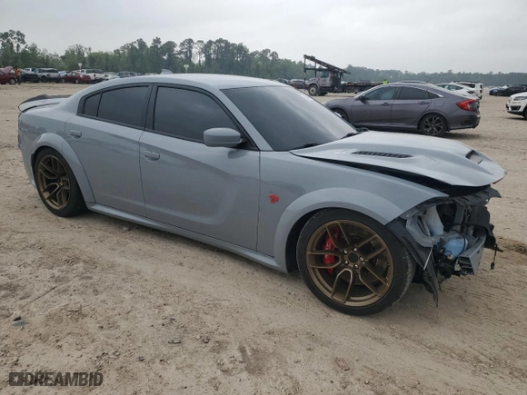 2021 Dodge Charger SRT Hellcat Widebody with VIN 2C3CDXL91MH630216, listed as a Copart auction lot 50769455 with 24,707 mi miles and Salvage Title. Bid and sale history available at carsss.com. Image 4.