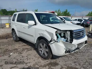 2013 Honda Pilot Touring z VIN 5FNYF4H99DB017351, wystawiony jako IAAI lot #42355167 z przebiegiem 122 191 mil mil oraz . Historia ofert i sprzedaży dostępna na DreamBid. Obrazek 1.