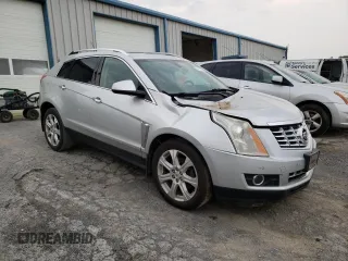 2015 Cadillac SRX Performance Collection with VIN 3GYFNFE36FS549358, listed as a Copart auction lot 59724065 with 132,045 mi miles and Salvage title. Bid and sale history available at DreamBid. Image 4.