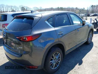 2017 Mazda CX-5 Touring with VIN JM3KFBCL2H0203497, listed as a IAAI auction lot 41860782 with 65,482 mi miles. Bid and sale history available at carsss.com. Image 4.