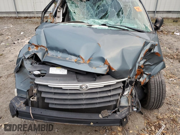 2005 Chrysler Town & Country Touring z VIN 2C4GP54L35R460908, wystawiony jako Copart lot #74486784 z przebiegiem Nie podano mil oraz Szkoda całkowita • Salvage title. Historia ofert i sprzedaży dostępna na DreamBid. Obrazek 12.