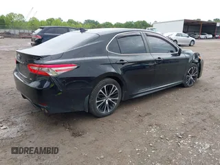 2019 Toyota Camry LE z VIN 4T1B11HK0KU739121, wystawiony jako IAAI lot #42372066 z przebiegiem 95 576 mil mil oraz . Historia ofert i sprzedaży dostępna na DreamBid. Obrazek 4.