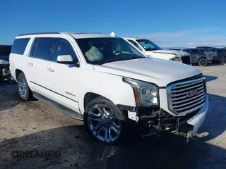 2017 GMC Yukon XL SLT z VIN 1GKS2GKC0HR207440, wystawiony jako IAAI lot #41715100 z przebiegiem 139 529 mil mil oraz . Historia ofert i sprzedaży dostępna na DreamBid. Obrazek 1.