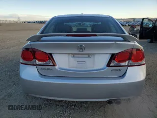 2010 Acura CSX Technology z VIN 2HHFD5F77AH201887, wystawiony jako Copart lot #77610604 z przebiegiem 94 442 mil mil oraz Szkody całkowita. Historia ofert i sprzedaży dostępna na DreamBid. Obrazek 6.