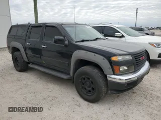 2010 GMC Canyon SLE1 with VIN 1GTJTCDE0A8136926, listed as a Copart auction lot 76193164 with 214,608 mi miles and Salvage Title. Bid and sale history available at carsss.com. Image 4.