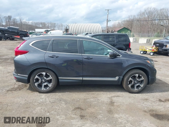 2019 Honda CR-V Touring with VIN 2HKRW2H9XKH636354, listed as a IAAI auction lot 41902615 with 66,781 mi miles and . Bid and sale history available at DreamBid. Image 13.