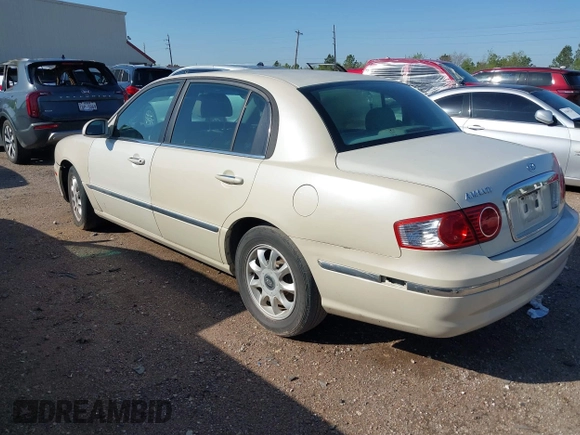 2004 Kia Amanti z VIN KNALD124745028164, wystawiony jako IAAI lot #41855331 z przebiegiem 165 072 mil mil oraz . Historia ofert i sprzedaży dostępna na DreamBid. Obrazek 3.