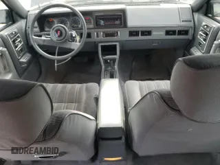 1988 Oldsmobile Cutlass z VIN 2G3AJ5133J2335499, wystawiony jako Copart lot #44587035 z przebiegiem 90 432 mil mil oraz Tytuł czysty. Historia ofert i sprzedaży dostępna na DreamBid. Obrazek 8.