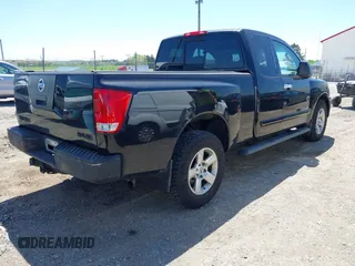 2006 Nissan Titan SE with VIN 1N6BA06B76N534667, listed as a IAAI auction lot 42143765 with 165,208 mi miles and . Bid and sale history available at DreamBid. Image 4.