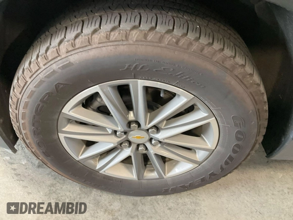 2022 Chevrolet Traverse LT with VIN 1GNERHKW8NJ150023, listed as a IAAI auction lot 42585752 with 102,823 mi miles and . Bid and sale history available at DreamBid. Image 2.
