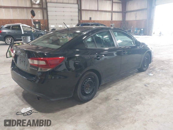 2021 Subaru Impreza with VIN 4S3GKAB64M3601075, listed as a IAAI auction lot 42530164 with 90,522 mi miles and . Bid and sale history available at DreamBid. Image 4.