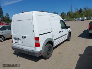 2013 Ford Transit Connect XL with VIN NM0LS7AN5DT176974, listed as a IAAI auction lot 42067541 with 140,690 mi miles. Bid and sale history available at carsss.com. Image 4.