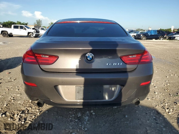 2014 BMW 6 Series 640i z VIN WBA6A0C58EDZ04545, wystawiony jako Copart lot #71086984 z przebiegiem 99 048 mil mil oraz Szkoda całkowita • Salvage title. Historia ofert i sprzedaży dostępna na DreamBid. Obrazek 6.