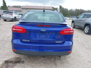 2015 Ford Focus Titanium with VIN 1FADP3J27FL298882, listed as a IAAI auction lot 42117247 with 124,185 mi miles and . Bid and sale history available at carsss.com. Image 16.