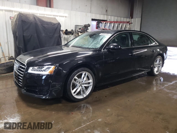 2017 Audi A8 z VIN WAU44AFD2HN014533, wystawiony jako Copart lot #46684705 z przebiegiem 94 030 mil mil oraz Szkody całkowita. Historia ofert i sprzedaży dostępna na DreamBid. Obrazek 1.