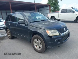 2012 Suzuki Grand Vitara Premium z VIN JS3TE0D23C4100926, wystawiony jako IAAI lot #42361791 z przebiegiem 255 911 mil mil oraz . Historia ofert i sprzedaży dostępna na DreamBid. Obrazek 1.