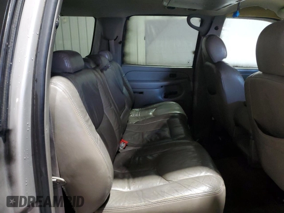 2004 Chevrolet Suburban LT z VIN 1GNFK16Z54J169373, wystawiony jako Copart lot #48302565 z przebiegiem 303 605 mil mil oraz Szkoda całkowita • Salvage title. Historia ofert i sprzedaży dostępna na DreamBid. Obrazek 11.