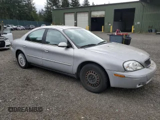 2004 Mercury Sable GS z VIN 1MEFM50U34G601378, wystawiony jako Copart lot #56952825 z przebiegiem 63 456 mil mil oraz Tytuł czysty. Historia ofert i sprzedaży dostępna na DreamBid. Obrazek 4.