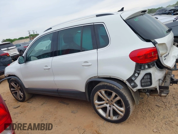 2016 Volkswagen Tiguan S with VIN WVGBV7AXXGW585445, listed as a IAAI auction lot 42083377 with 111,011 mi miles and . Bid and sale history available at DreamBid. Image 14.