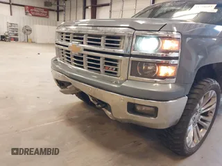 2015 Chevrolet Silverado 1500 LTZ with VIN 3GCUKSEC1FG473825, listed as a IAAI auction lot 41710553 with 212,959 mi miles and . Bid and sale history available at DreamBid. Image 19.