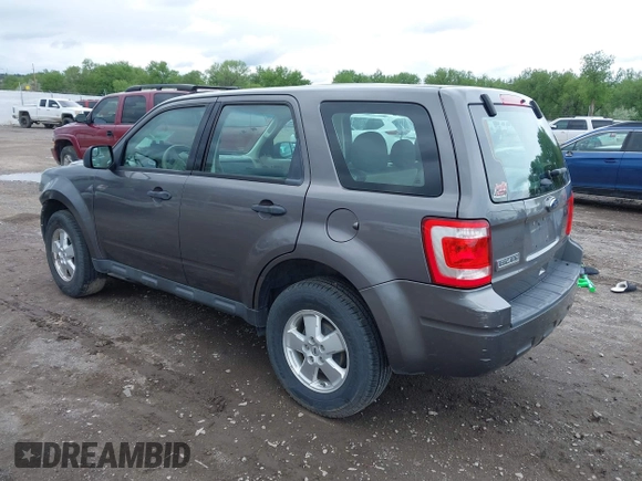 2011 Ford Escape XLS with VIN 1FMCU9C73BKC51595, listed as a IAAI auction lot 42266748 with 204,043 mi miles and . Bid and sale history available at DreamBid. Image 3.