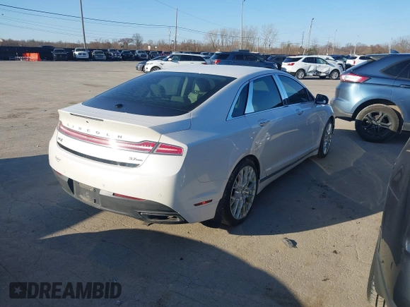 2016 Lincoln MKZ z VIN 3LN6L2JK8GR624664, wystawiony jako IAAI lot #41774444 z przebiegiem 106 695 mil mil oraz . Historia ofert i sprzedaży dostępna na DreamBid. Obrazek 4.