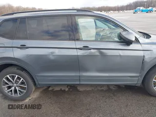 2021 Volkswagen Tiguan S with VIN 3VV1B7AX8MM016874, listed as a IAAI auction lot 41633090 with 76,857 mi miles and . Bid and sale history available at DreamBid. Image 6.