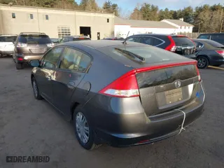 2010 Honda Insight LX with VIN JHMZE2H52AS014667, listed as a IAAI auction lot 41258620 with 138,419 mi miles. Bid and sale history available at carsss.com. Image 3.