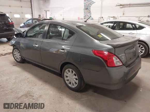 2018 Nissan Versa Sedan SV with VIN 3N1CN7AP7JL860195, listed as a IAAI auction lot 41801080 with 103,984 mi miles. Bid and sale history available at carsss.com. Image 3.