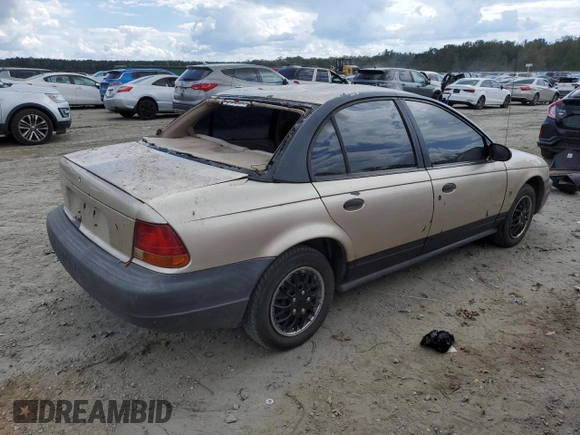 1999 Saturn SL z VIN 1G8ZH5280XZ178863, wystawiony jako Copart lot #73660474 z przebiegiem 195 738 mil mil oraz Szkody całkowita. Historia ofert i sprzedaży dostępna na DreamBid. Obrazek 3.