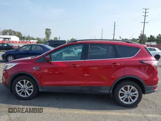 2017 Ford Escape SE with VIN 1FMCU0GD4HUC27041, listed as a IAAI auction lot 42127328 with 107,860 mi miles. Bid and sale history available at carsss.com. Image 14.